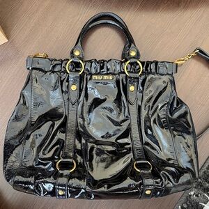Miu Miu Shiny Black Satchel with Gold Accents